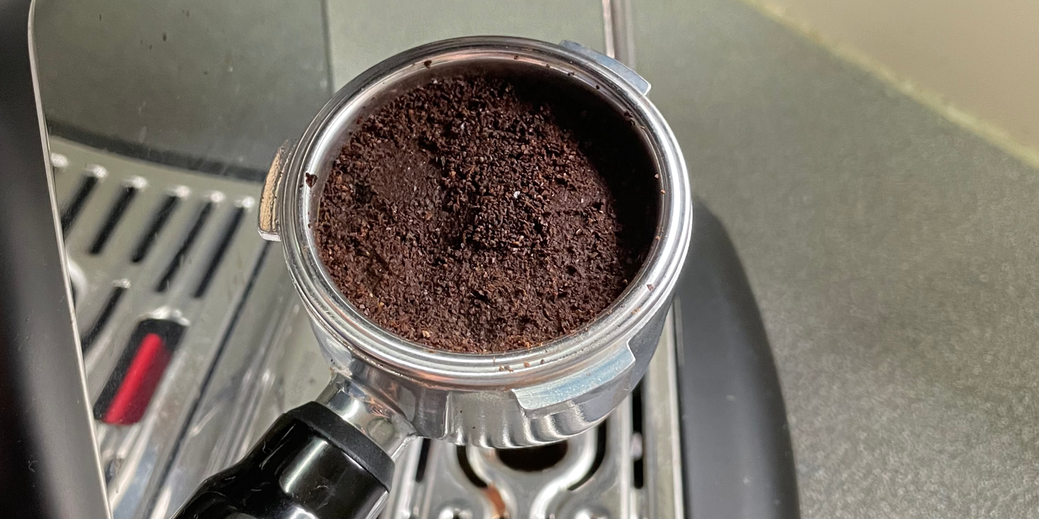 Spent coffee grounds removed from a coffee machine